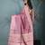 elegant pink tissue saree with intricate border