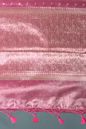 elegant pink tissue saree with intricate border