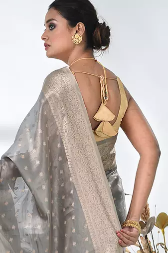 elegant grey tissue saree with intricate border