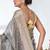 elegant grey tissue saree with intricate border