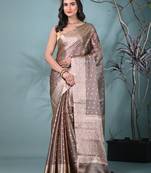 elegant brown tissue saree with intricate border