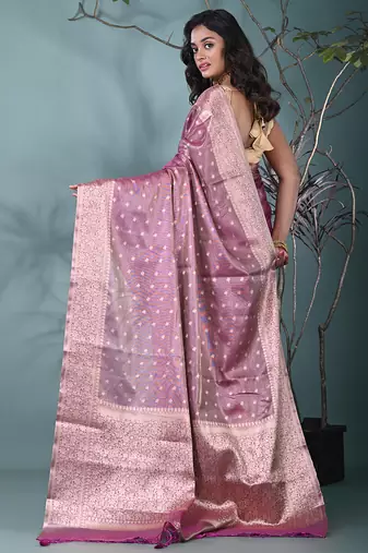 elegant purple tissue saree with intricate border