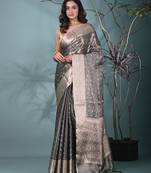 elegant black tissue saree with intricate border