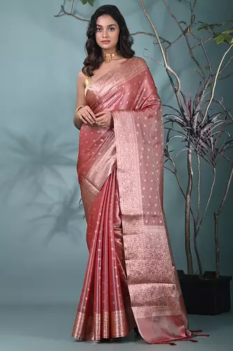elegant red tissue saree with intricate border