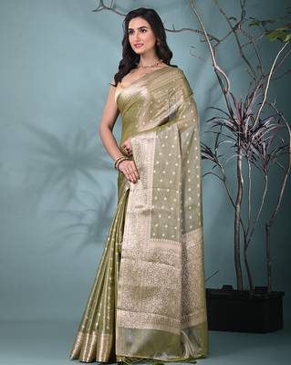 elegant sap green tissue saree with intricate border 2