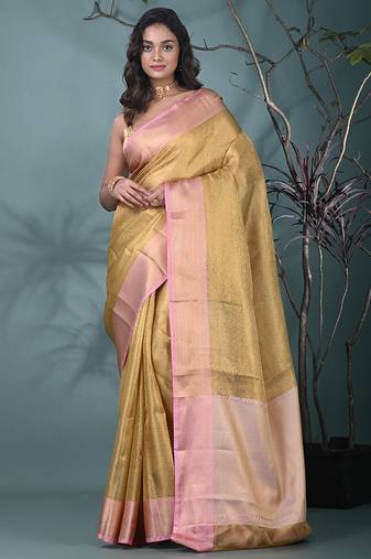 golden tissue brocade saree with pink border