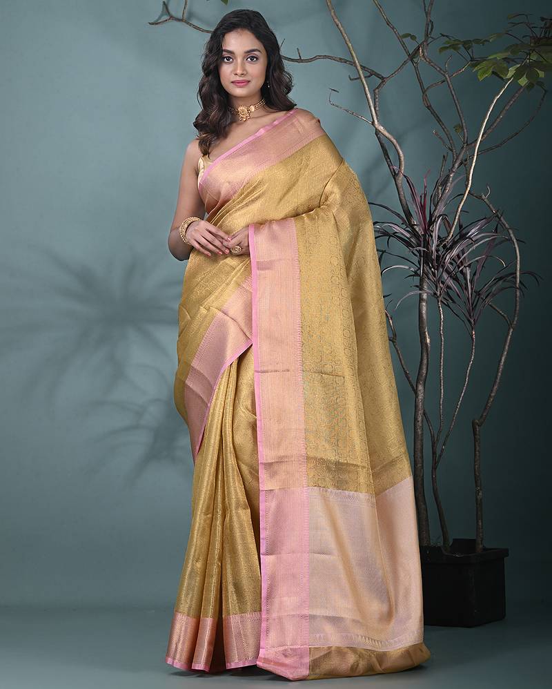 golden tissue brocade saree with pink border