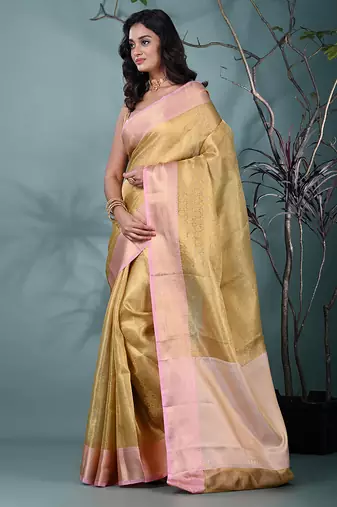 golden tissue brocade saree with pink border