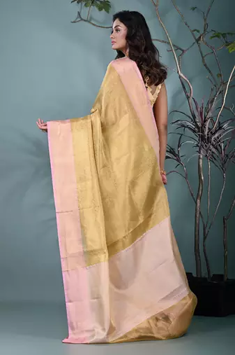 golden tissue brocade saree with pink border