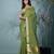 sap green catlon soft art silk saree with checkered pattern