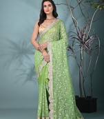 green chanderi silk blend saree with embroidered floral design