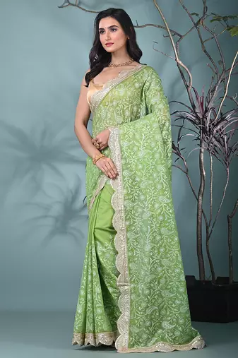 green chanderi silk blend saree with embroidered floral design