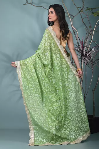 green chanderi silk blend saree with embroidered floral design