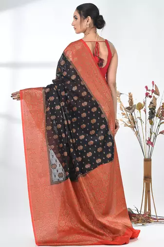 black georgette saree with red and gold border