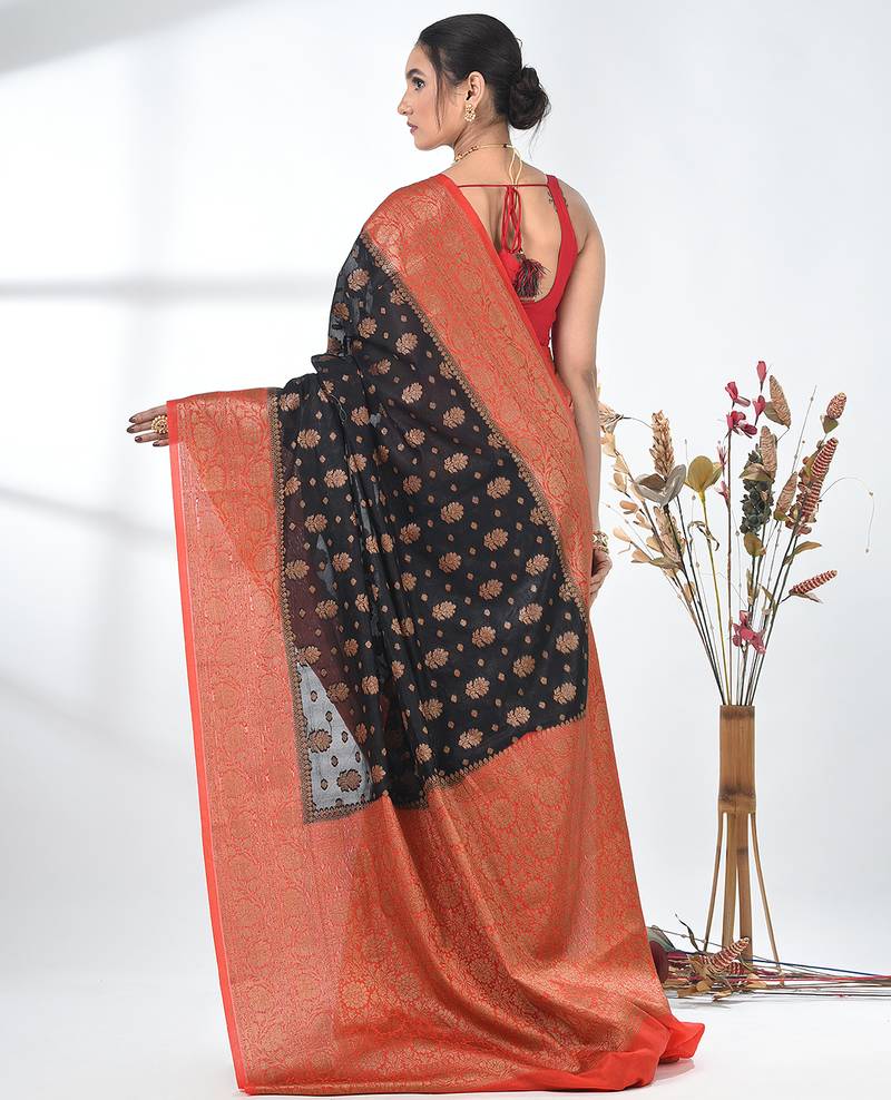 black georgette saree with red and gold border