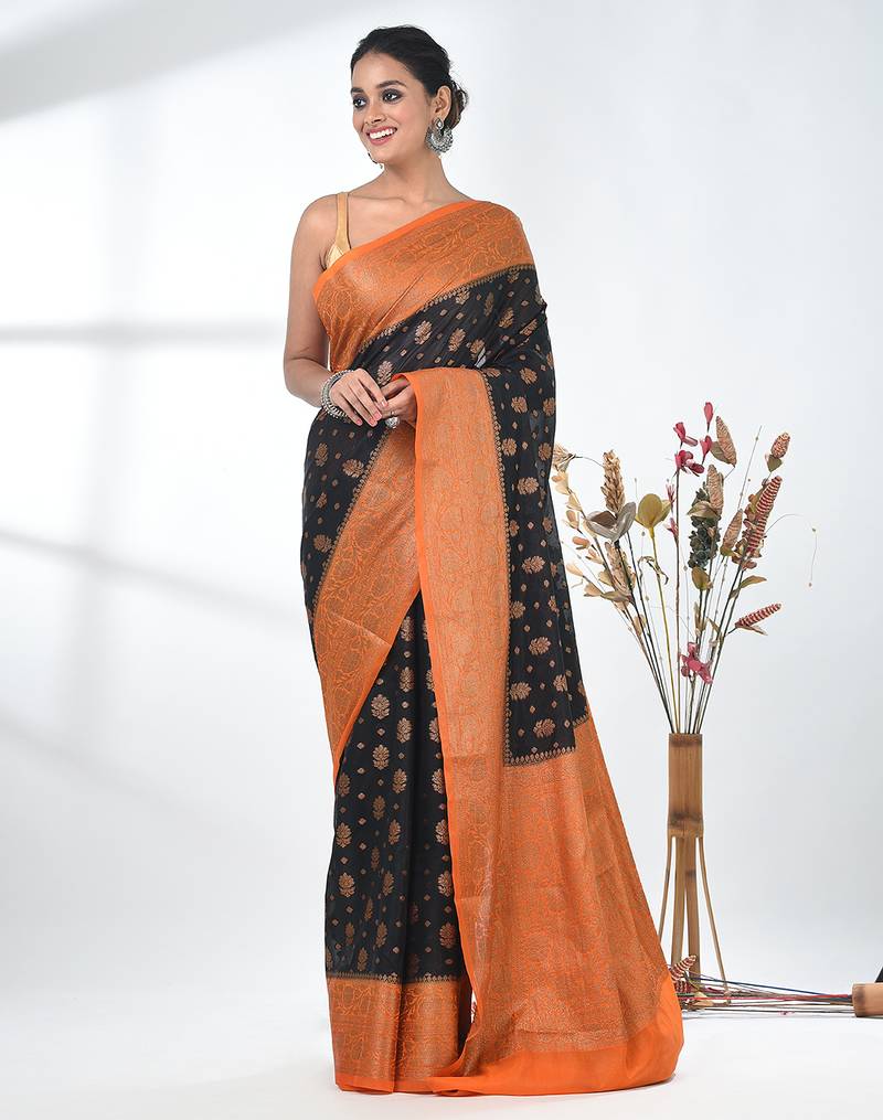 black georgette saree with red and gold border