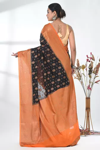 black georgette saree with red and gold border