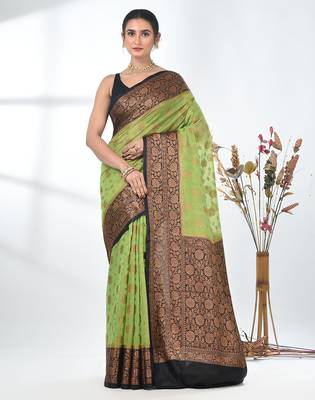 green georgette saree with red and gold border 1