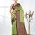 green georgette saree with red and gold border