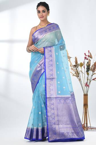 sky blue organza saree with floral motifs and blue border