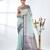 pastel blue organza saree with floral motifs and blue border