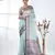 pastel blue organza saree with floral motifs and blue border