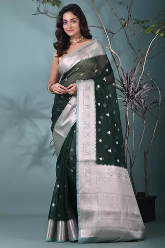 green organza saree with floral motifs and sea green border