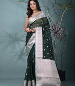 green organza saree with floral motifs and sea green border