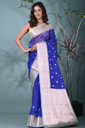 blue organza saree with floral motifs and sea green border