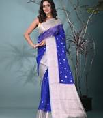 blue organza saree with floral motifs and sea green border