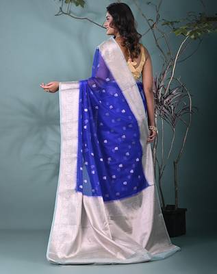 blue organza saree with floral motifs and sea green border 3