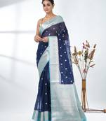 navy blue organza saree with floral motifs and light blue border