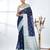 navy blue organza saree with floral motifs and light blue border