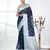 navy blue organza saree with floral motifs and light blue border