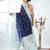 navy blue organza saree with floral motifs and light blue border