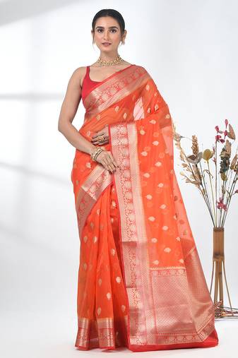 orange organza saree with floral motifs and sea green border