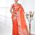 orange organza saree with floral motifs and sea green border