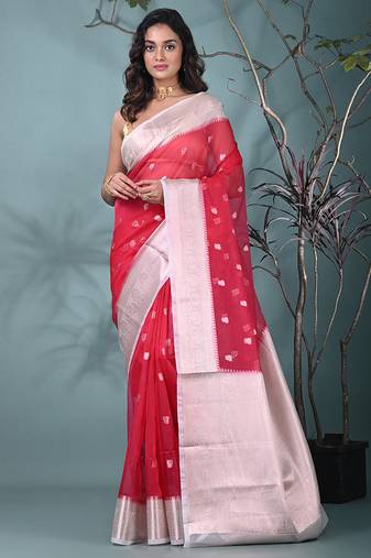 fuchsia organza saree with floral motifs and sea green border