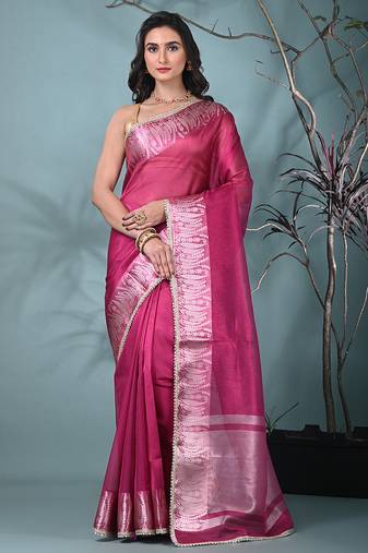 fuchsia tissue saree with intricate silver zari border