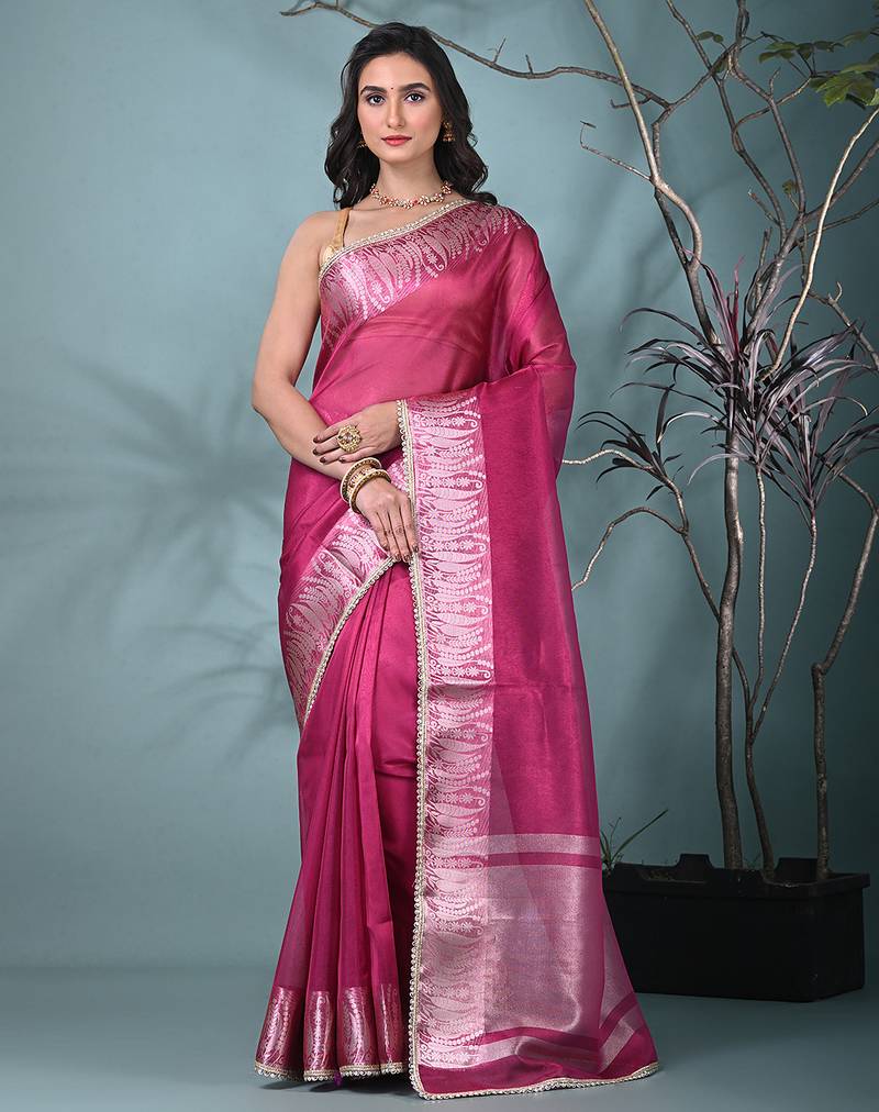 fuchsia tissue saree with intricate silver zari border