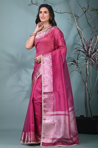 fuchsia tissue saree with intricate silver zari border