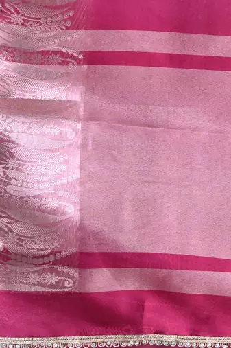 fuchsia tissue saree with intricate silver zari border
