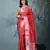 red tissue saree with intricate silver zari border