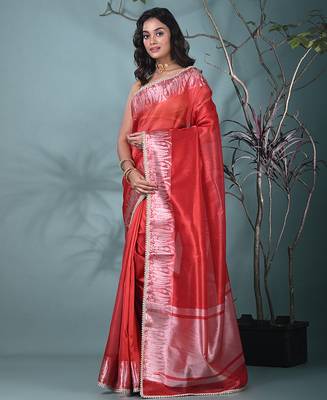 red tissue saree with intricate silver zari border 2