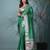 green tissue saree with intricate silver zari border