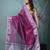 purple tissue saree with intricate silver zari border