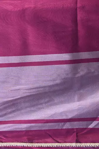 purple tissue saree with intricate silver zari border