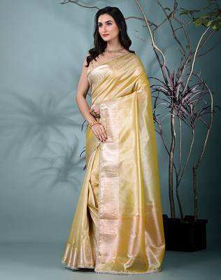 yellow tissue saree with intricate silver zari border 2