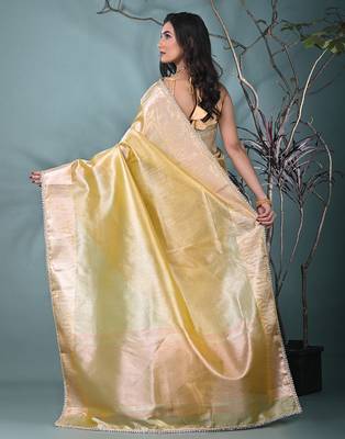 yellow tissue saree with intricate silver zari border 3