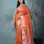 orange tissue saree with intricate silver zari border